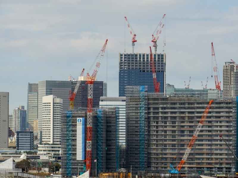Expanding urban skyline showing infrastructure development and economic growth in modern cities