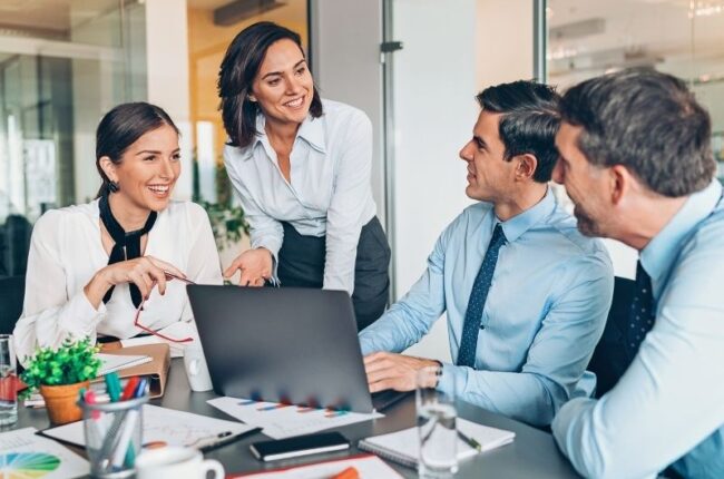 Alt text: Next-generation family business leaders participating in a professional leadership meeting.
